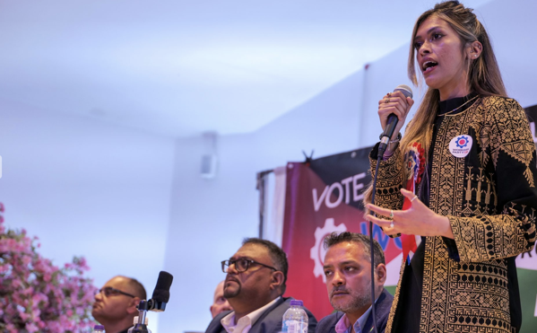 Halima Khan speaking at a Workers Party event